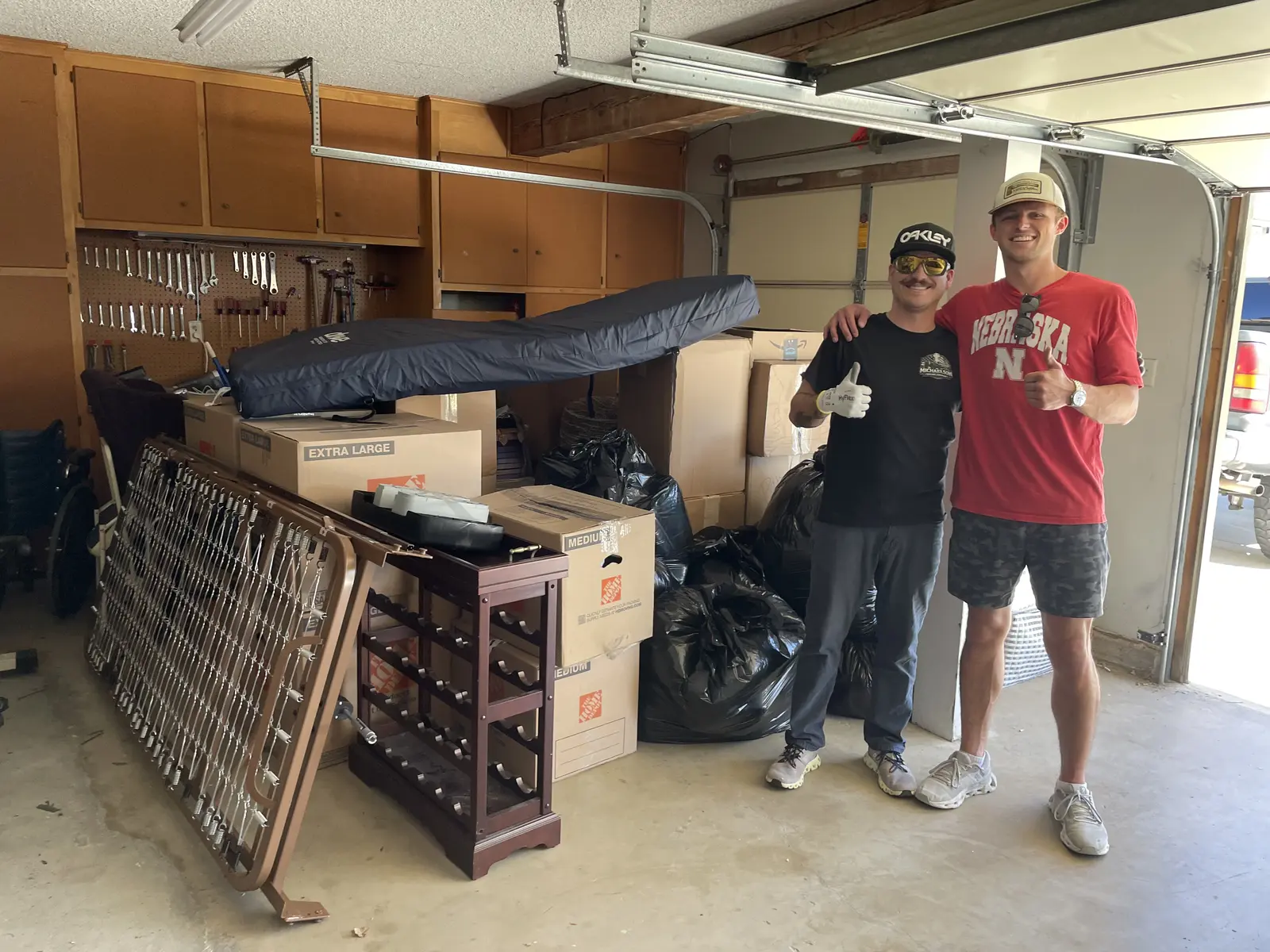 Michaelson crew after packing and organizing a garage